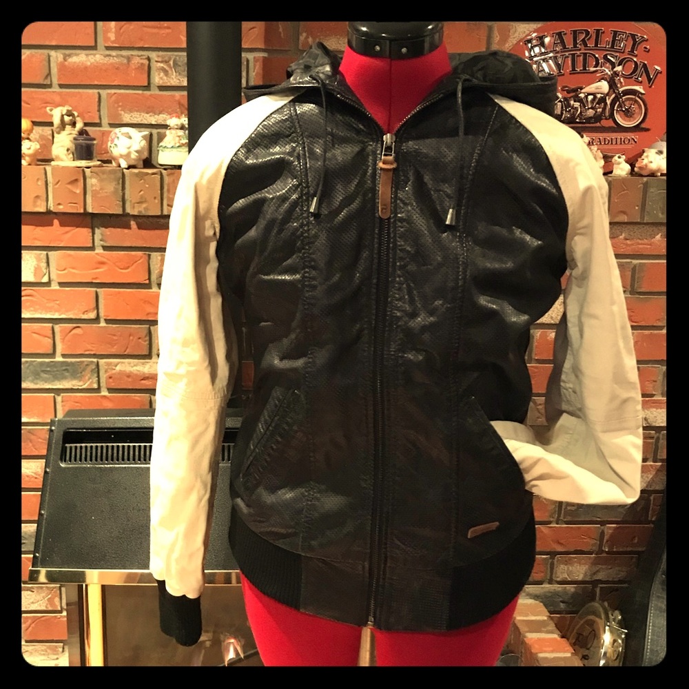 Back and white perforated Leather jacket.